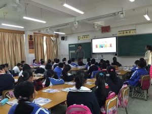 Kids learning STEM in classroom with RoboThink presentation